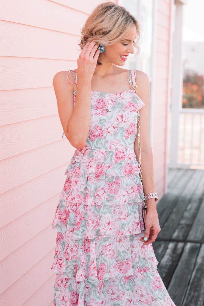 blue and pink floral dress with blue floral earrings