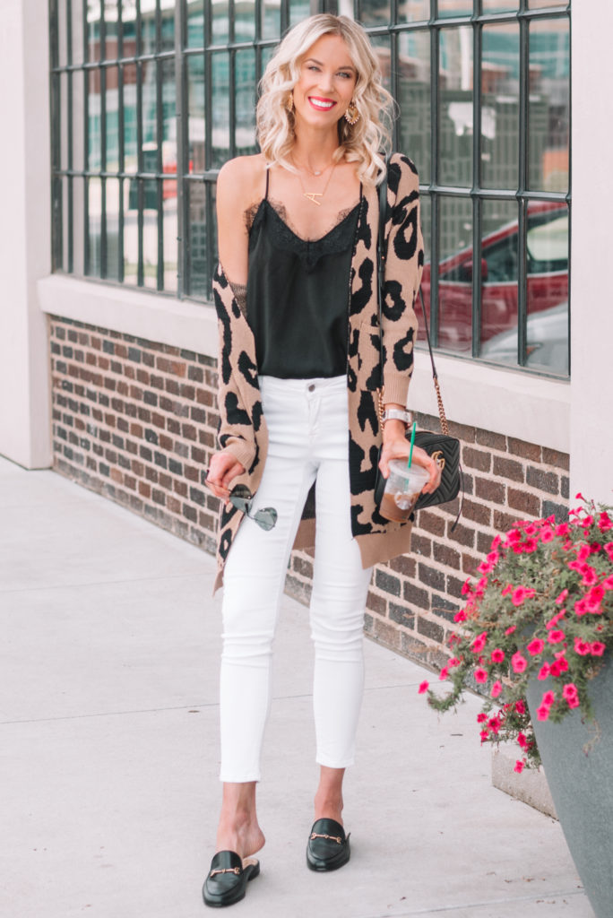 fall transition outfit, leopard cardigan, white jeans, black and white outfit