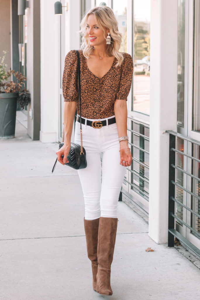 adorable leopard top, white jeans, knee high boots