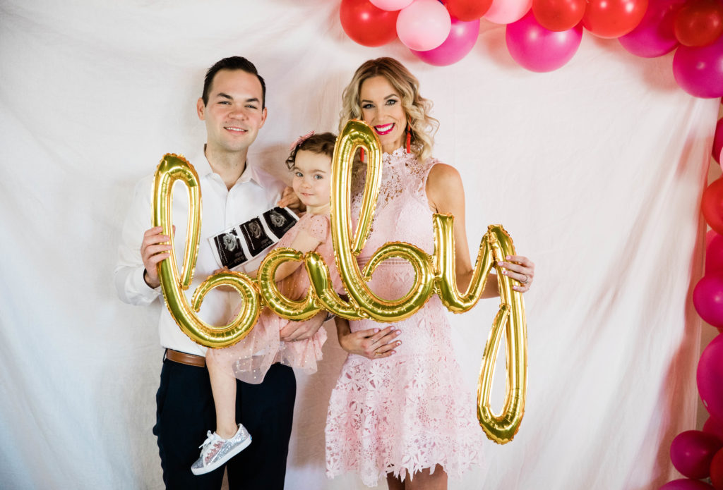 second baby announcement, pregnancy announcement, baby balloon, pink balloon arch, second baby pregnancy announcement