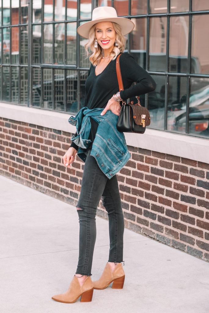 all black outfit with jean jacket and boots
