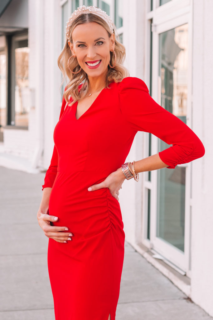 second trimester bump with red dress, early pregnancy dress