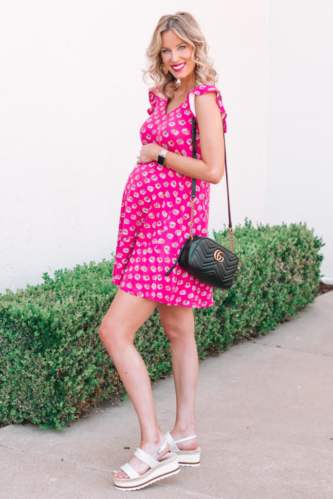 This non-maternity pink swing dress with flutter sleeves is the cutest and easiest thing to wear! I love that it's sleeveless and cool. 
