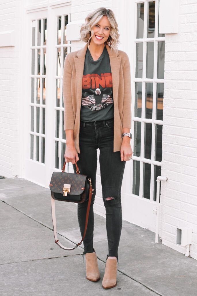 J.Crew sweater blazer worn with a graphic tee and black jeans. 
