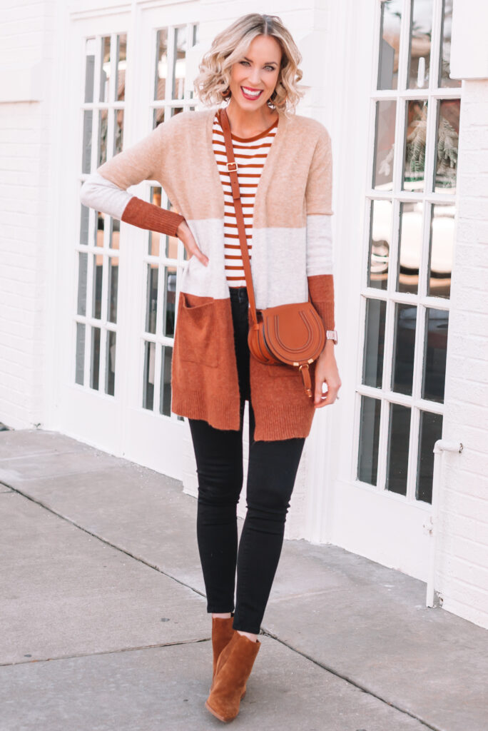 I love this colorblock striped cardigan paired with a striped shirt and black jeans! Click this post to see how I am remixing it as part of my no buy January.