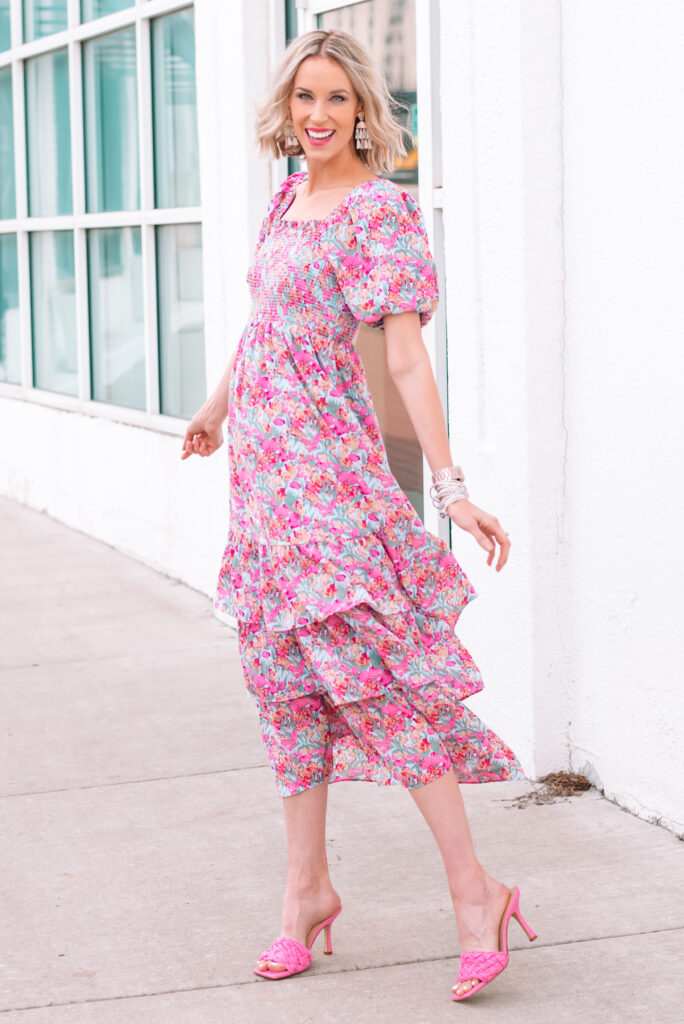 In love with this spring look! This floral dress is perfect with my pink sandals, and I am excited to share a Marc Fisher 2021 discount code with you!