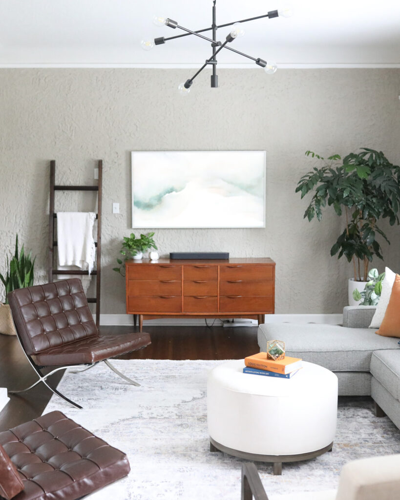 I'm beyond excited to reveal our transitional living room update with Luxe Furniture & Design Tulsa. It's everything we ever wanted and more with the comfy, large sectional with performance fabric, kid friendly coffee table, modern recliner, and more.