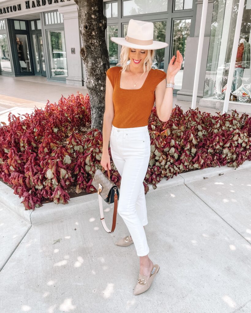 I love this rust colored bodysuit paired with my white jeans for a simple outfit. I'm sharing 6 ideas on how to wear a bodysuit in this post!
