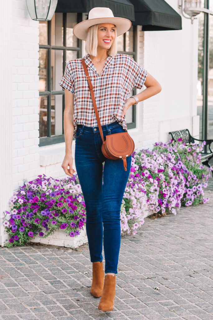 I am loving this light weight short sleeve plaid shirt for an easy fall transition outfit idea! You can wear it now with jeans and mules or boots and later with any layer of your choosing! 