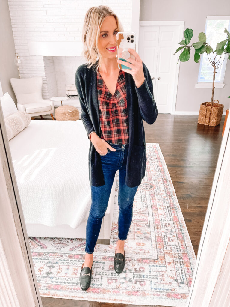 This plaid shirt can be worn so many ways! I love that it has both black and brown it. You can pair it with either a black cardigan as shown or camel accents. 