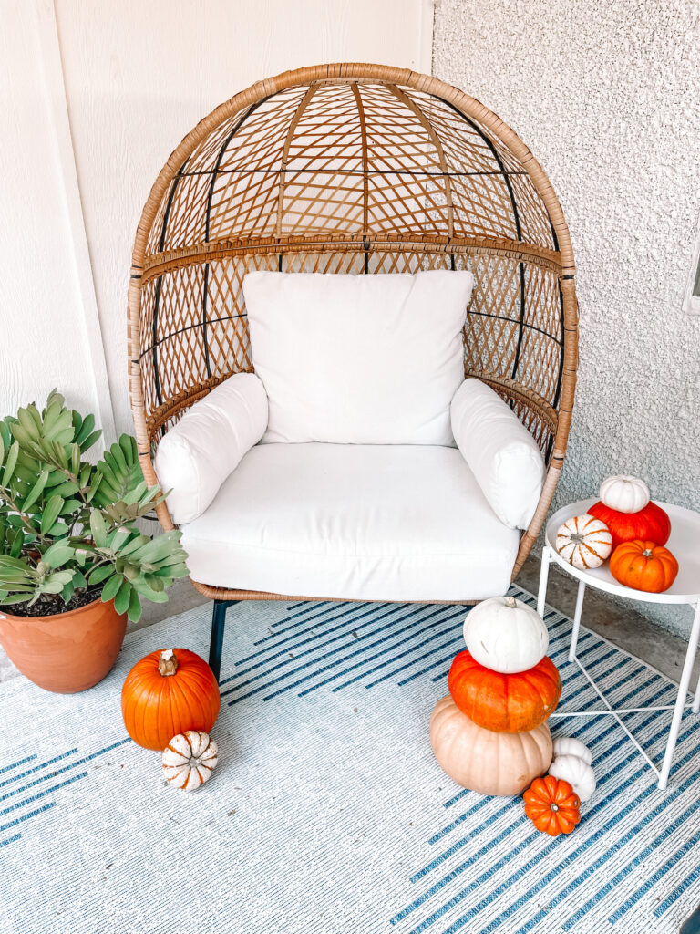 After a recent spruce up, I thought it would be fun to share the best affordable egg chairs and affordable porch decor. I am so happy with how this space turned out! 
