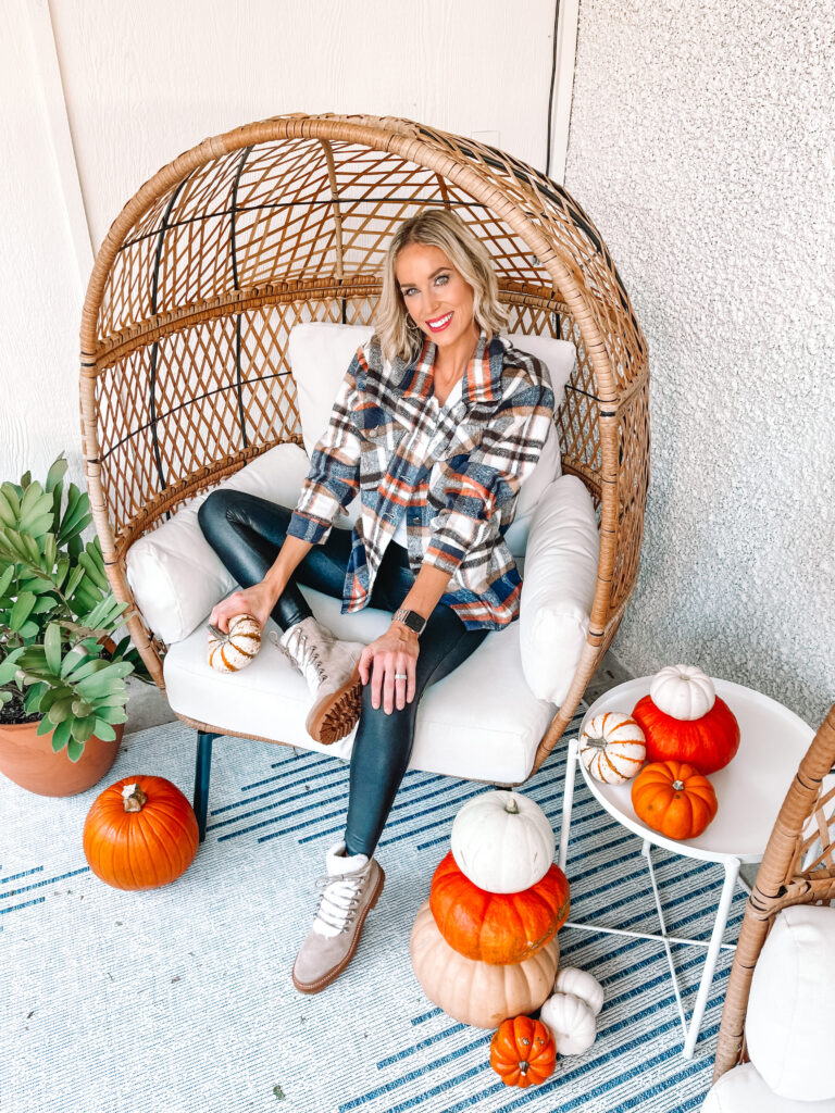 After a recent spruce up, I thought it would be fun to share the best affordable egg chairs and affordable porch decor. I am so happy with how this space turned out! Plus this plaid shirt jacket and these leather leggings are giving me all the fall feelings!