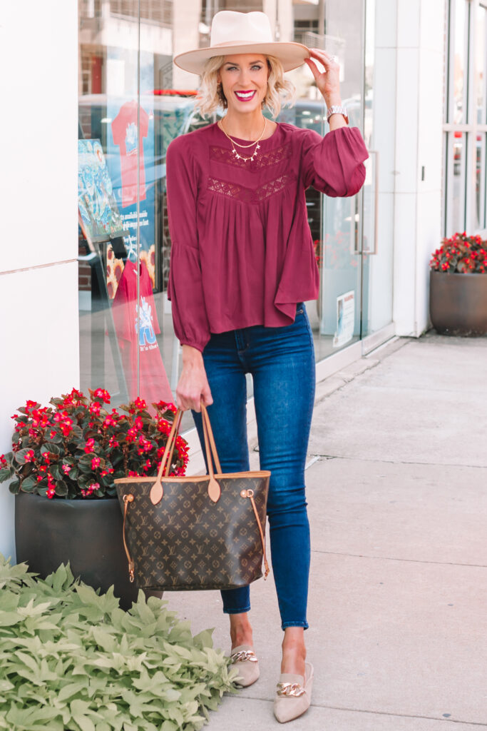 I love this burgundy colored fall blouse! it's so easy to wear. 