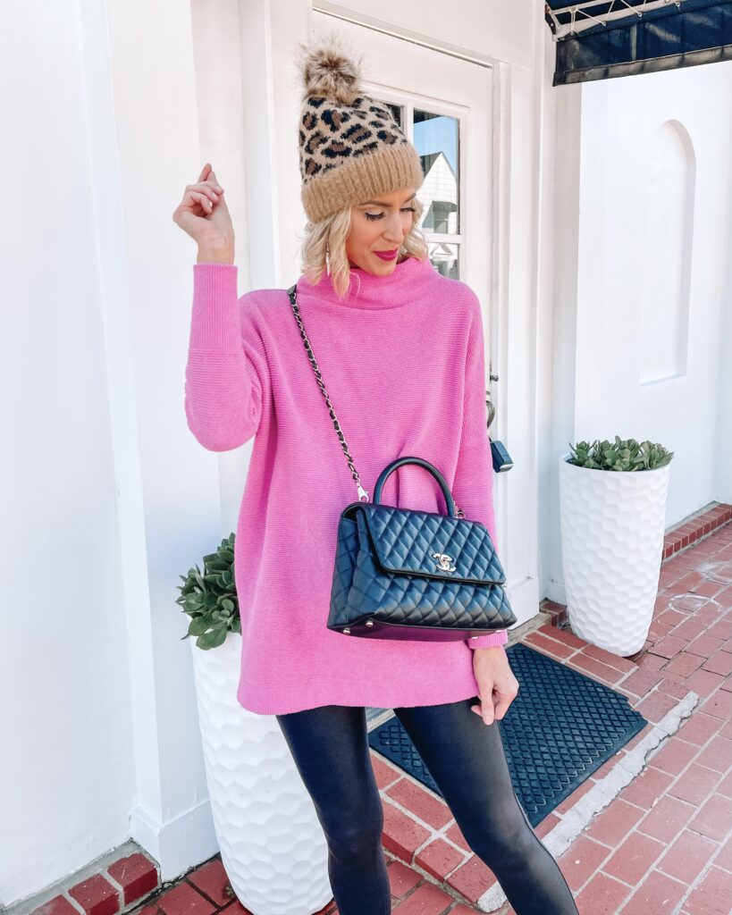 The Free People Ottoman sweater in pink is restocked this year, and I am so happy! It's such a great color. It's a great quality, thick, long sweater which makes it perfect for leggings.