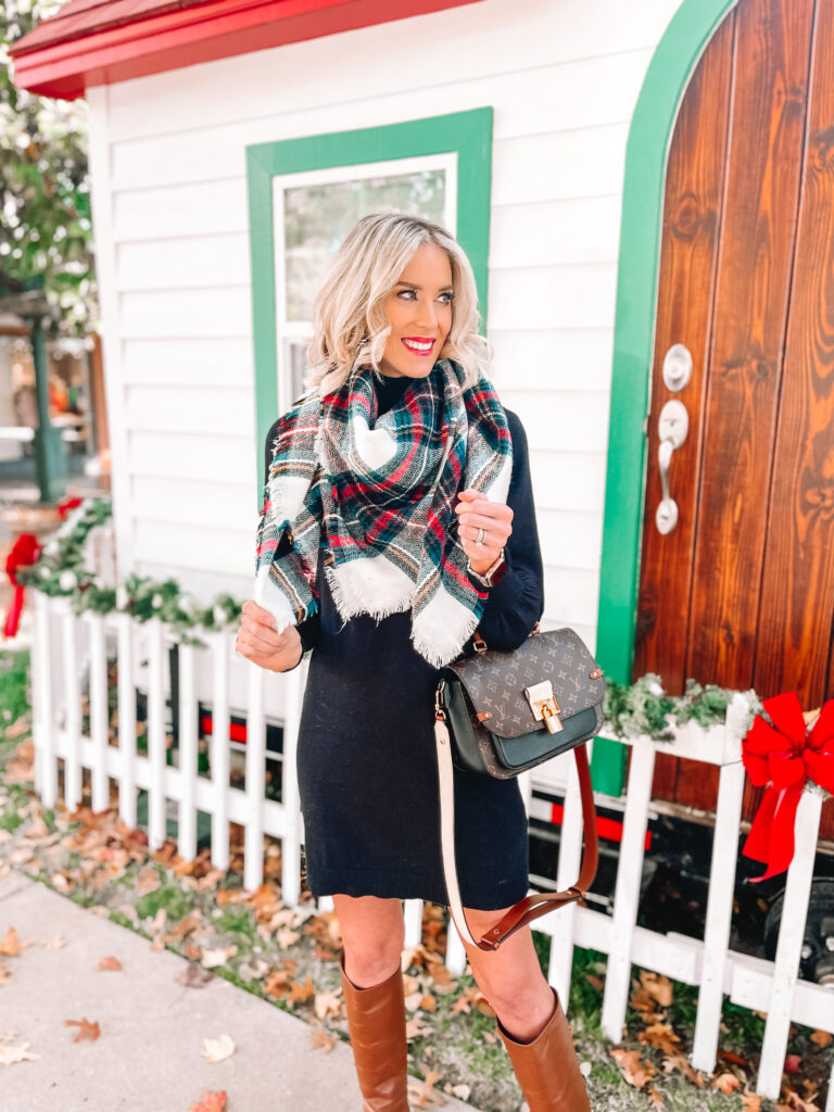 This black sweater dress is such a classic piece! You can style it so many ways. Its really a blank canvas you can get creative with. Here I went for a Christmas vibe with my plaid scarf and red lip. 
