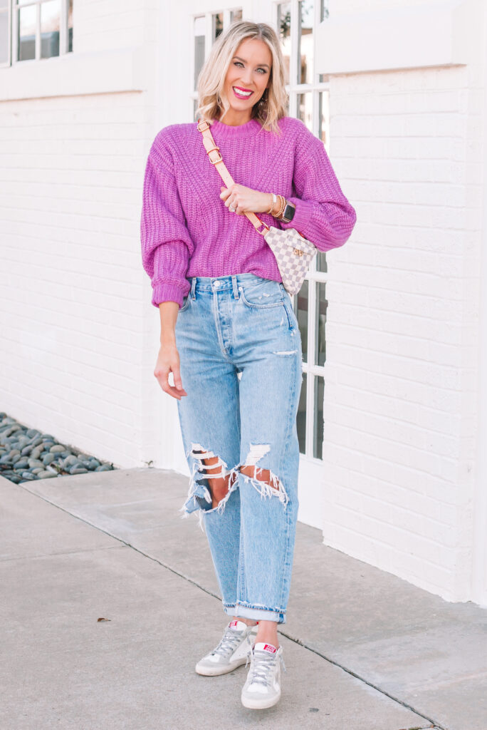 Pair your bright sweater with distressed jeans for an easy and cute look!