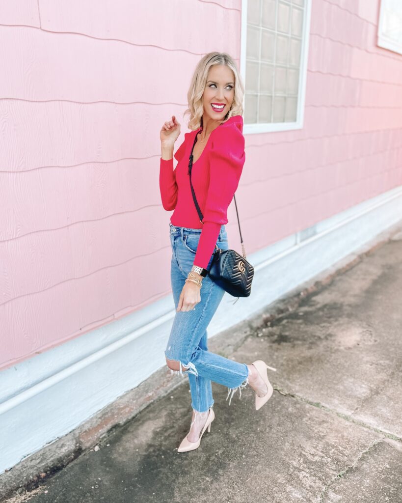 I am OBSESSED with this v-neck puff sleeve sweater! I love the color and flattering v-neck. The puff sleeves create such a great shape too. I paired it with jeans and heels for a girls night out.