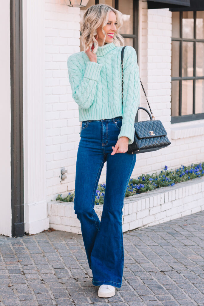 Wondering what jeans are in style and if flare jeans are in style for 2022? Then this is the post for you! Click to read more and get some styling tips.