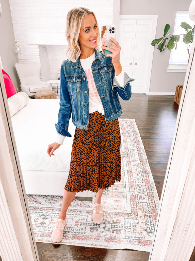 Are you a teacher looking for outfit ideas? Consider pairing a midi skirt with a graphic tee and a jean jacket. 