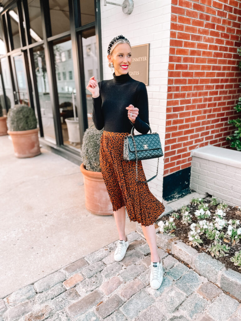 I firmly believe that a midi skirt can be one of the most versatile items in your closet. A closet chameleon if you will. Today I aim to prove my argument true by sharing 5 ways to wear a leopard midi skirt from dressy to casual from mom life to office life.