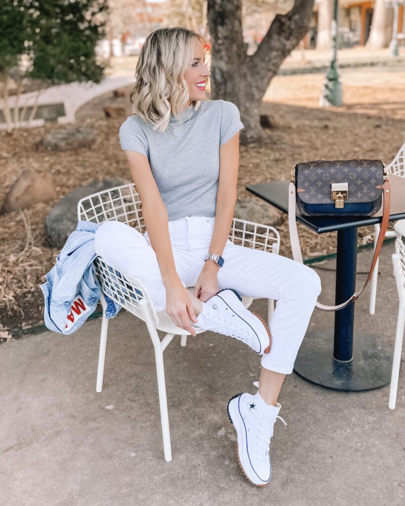 Pair a grey tee with white jeans and a platform converse for a fun and cute look!