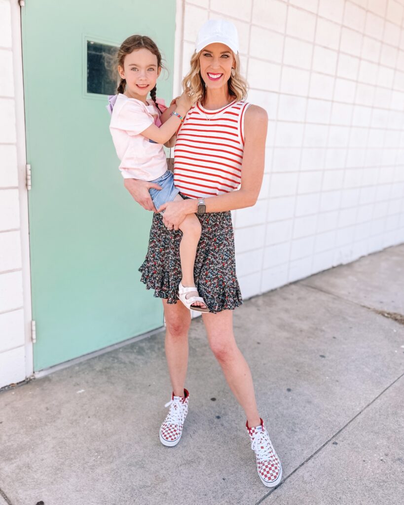 A cute mini skirt can be such a versatile wardrobe piece. Here are 5 ways to style a short floral skirt from dressy to casual! I love it with sneakers and a tank for summer mom mode. 