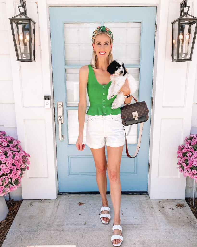 Gosh I love these $18 shorts, and they have gotten so much wear! I'm rounding up 10 ways to wear white jean shorts all with affordable tops! My bold green top and headband are the perfect pairing. 