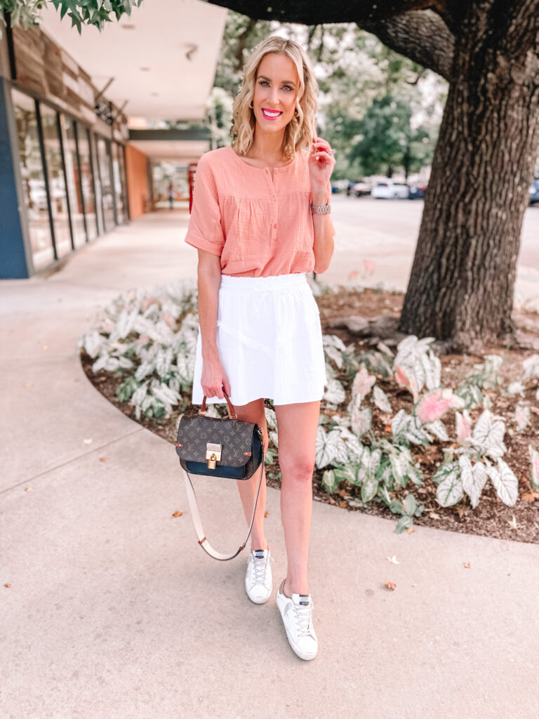 If you are looking for high quality, affordable pieces that you can wear now and transition to fall I've got the post for you! I'm excited to share my first Gibsonlook try on haul! I love this peach henley blouse styled with a white skirt. 