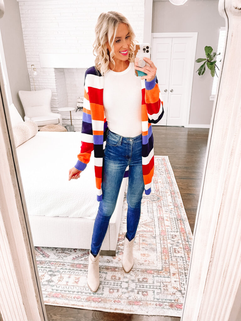 I LOVE a good cardigan in the fall. There is just something about feeling all cozy and layered. I wanted to round up 7 fall cardigans $45 and under for you today! This multicolored stripe cardigan is really fun. 