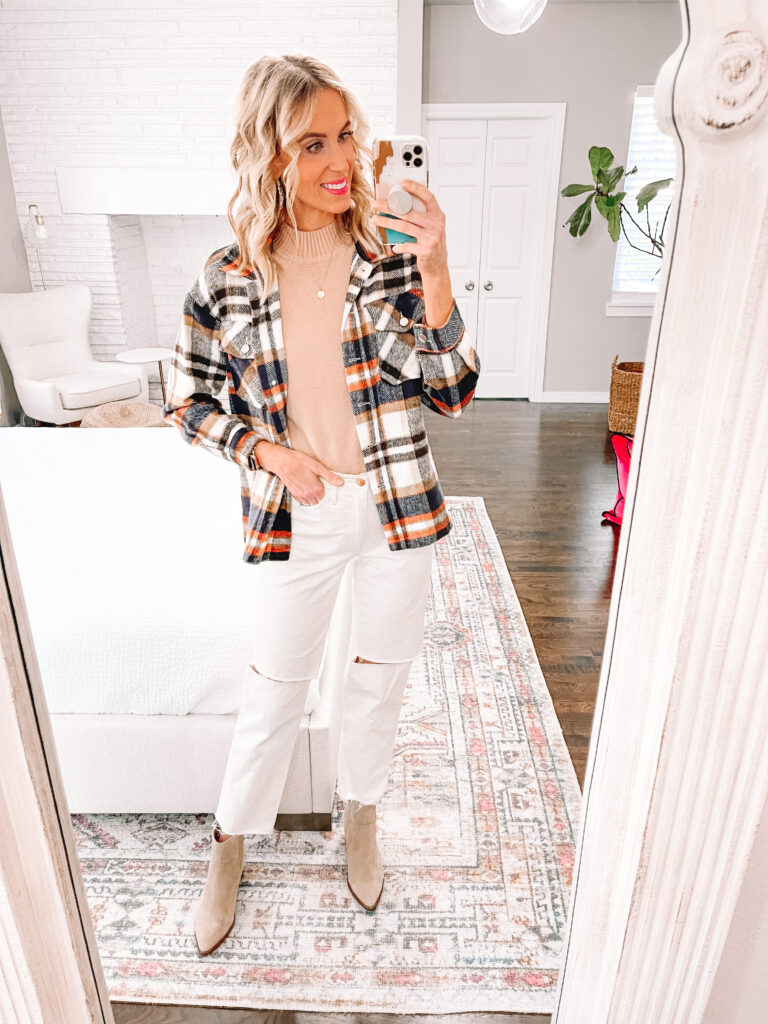 Pair a plaid shacket with straight leg jeans and boots for a modern fall outfit. 