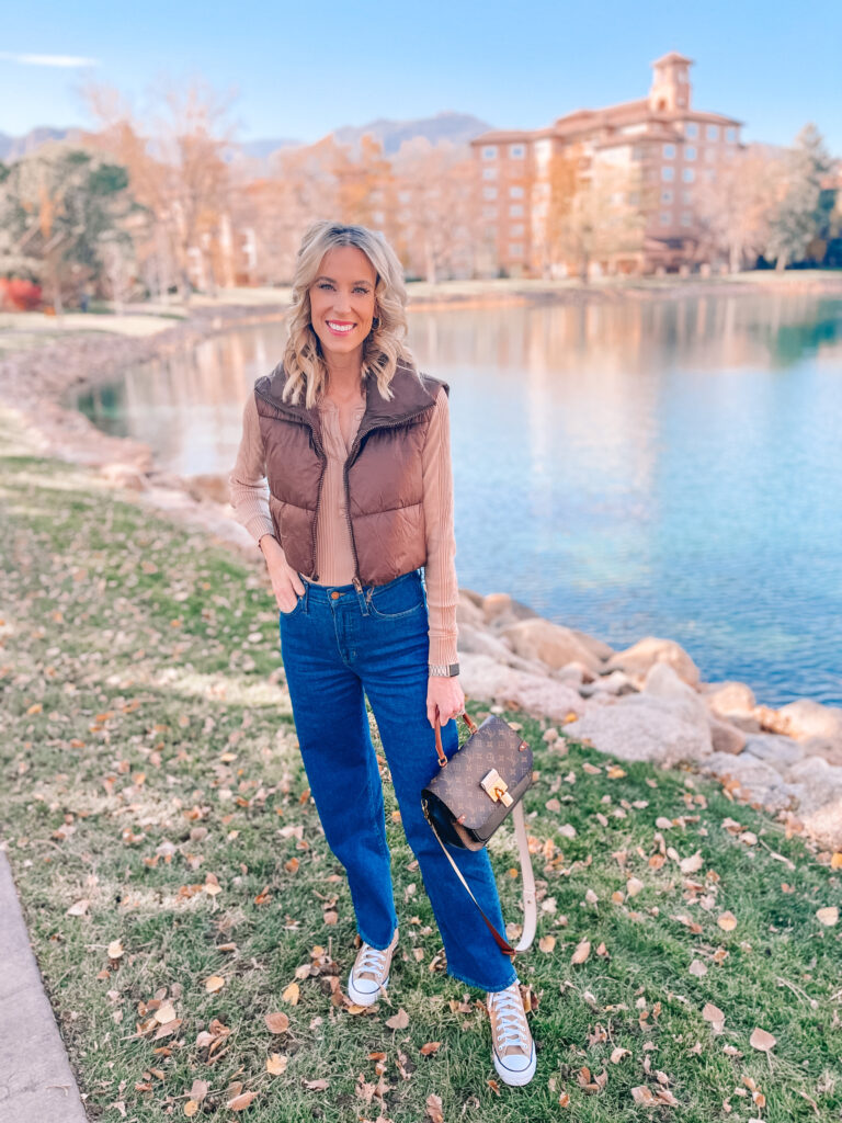 Wondering how to wear wide leg jeans? Today I'm sharing NINE different ways I have styled wide leg jeans to give you some style inspiration! I love cropped puffer vest with these wide leg jeans and converse!