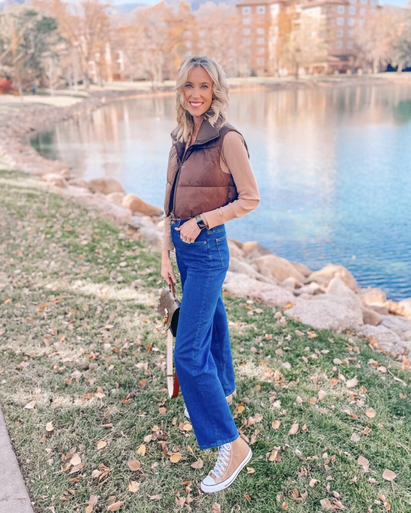 Wondering how to wear wide leg jeans? Today I'm sharing NINE different ways I have styled wide leg jeans to give you some style inspiration! I love cropped puffer vest with these wide leg jeans and converse!
