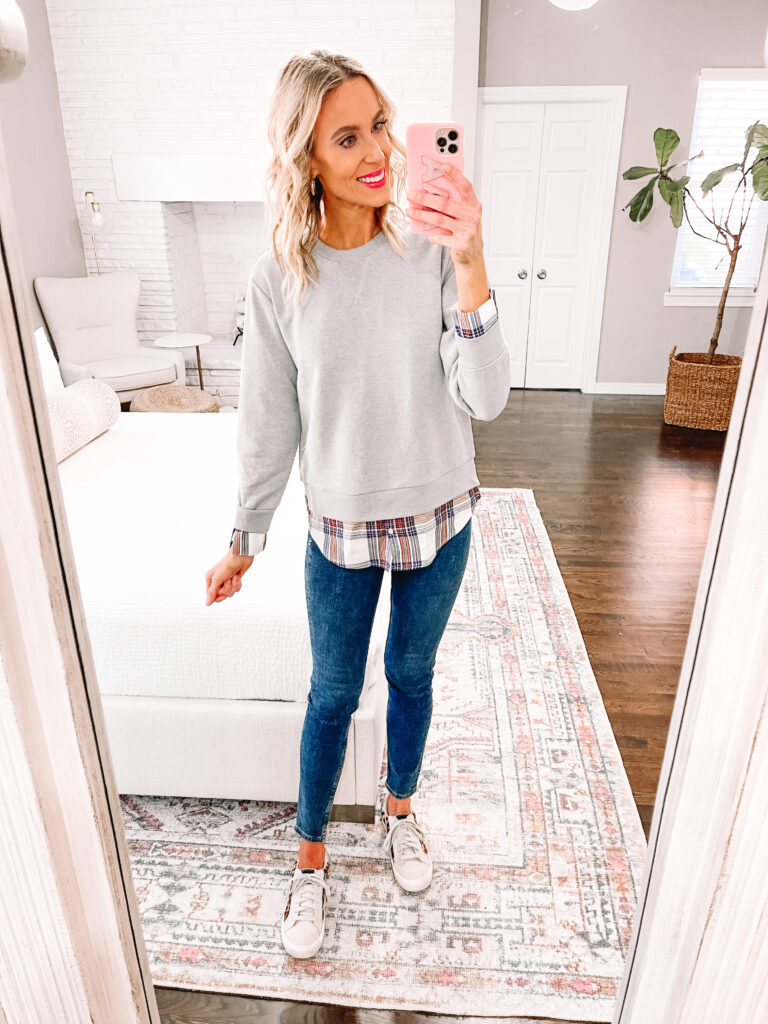 Whether you prefer leggings, casual and cute jeans outfits, or dresses, I have you covered with Thanksgiving outfit ideas $40 and under! This mixed media plaid top and jean combo is casual and easy to wear. 