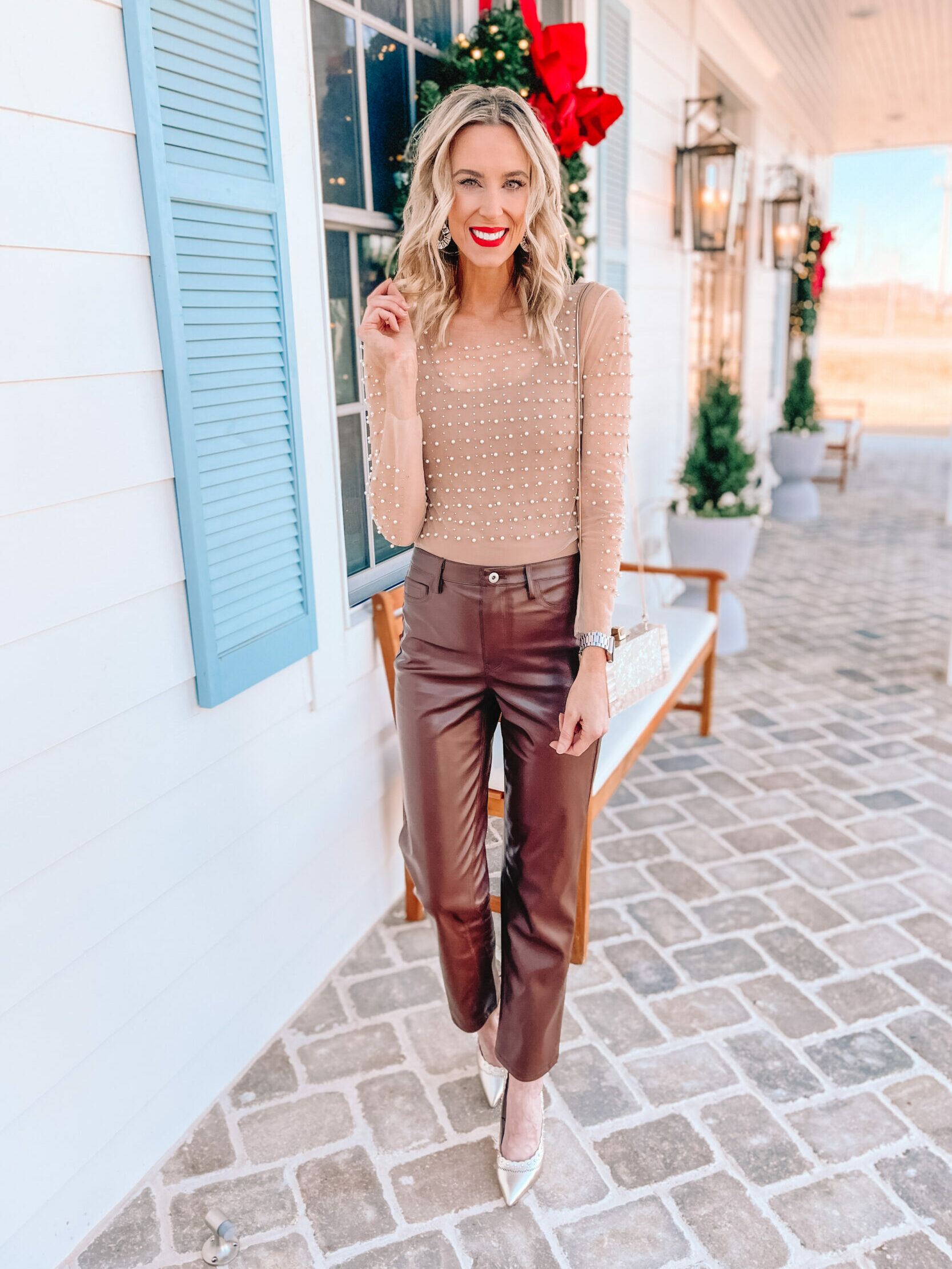 I am loving this Amazon sheer pearl rhinestone top for NYE! I styled it with my brown leather pants and gold heels. You can wear it so many ways though!