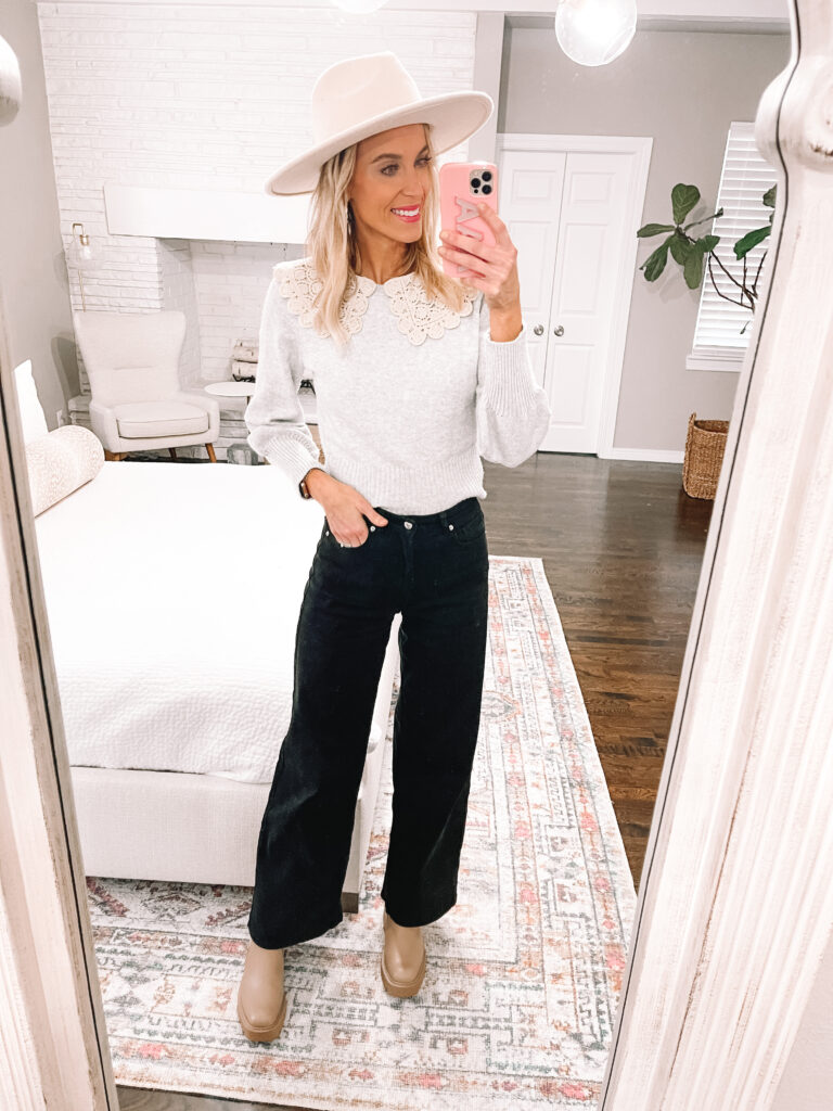 Try pairing your wide leg jeans with chunky chelsea boots for a fun winter outfit. 