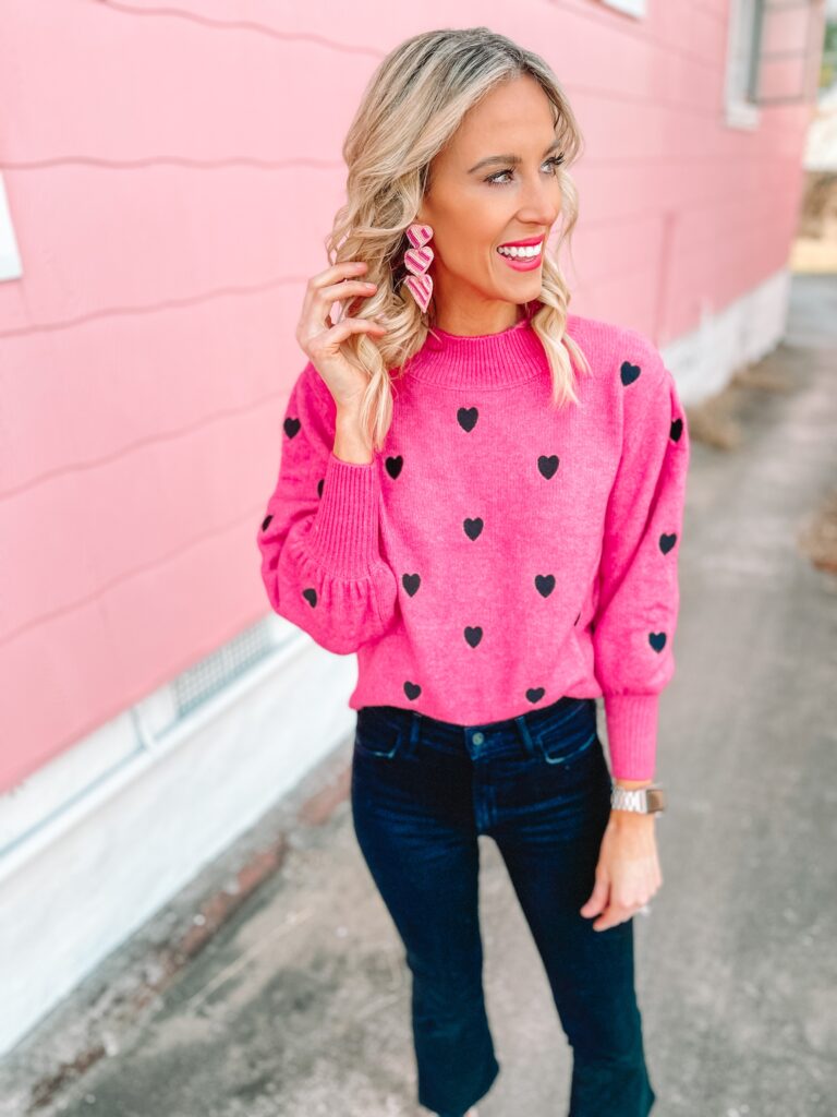 I am loving this pink heart sweater with the little embroidered hearts and black jeans. A cute and easy look!