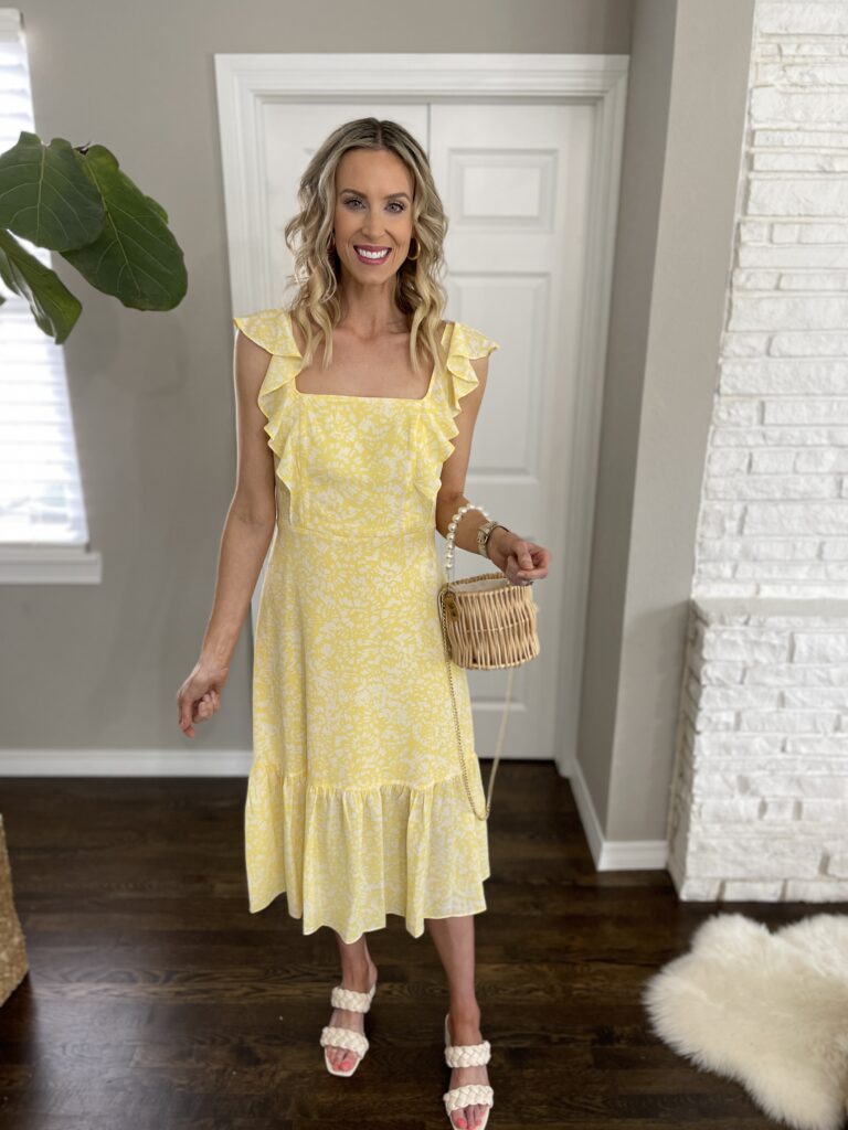 How cute is this yellow midi dress?!