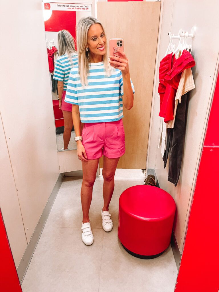 Sharing a HUGE target try on haul with nothing over $32. You are going to LOVE these spring pieces like these super fun pink shorts paired with this blue and white striped top. 