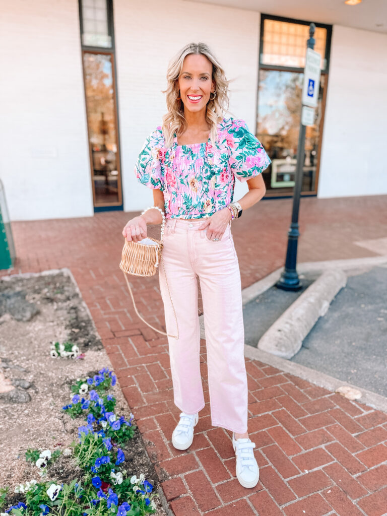 Have you noticed that colored jeans and pants are really trending lately? From brights like a bold pink, green, or orange, to lighter colors, it's all the range lately! I'm sharing how to wear pink jeans with 6 outfit examples. You'll love this all pink outfit!