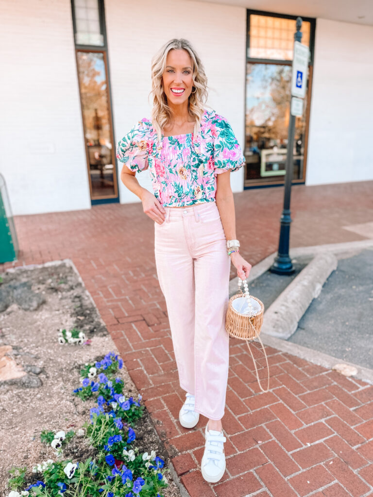Have you noticed that colored jeans and pants are really trending lately? From brights like a bold pink, green, or orange, to lighter colors, it's all the range lately! I'm sharing how to wear pink jeans with 6 outfit examples. You'll love this all pink outfit!