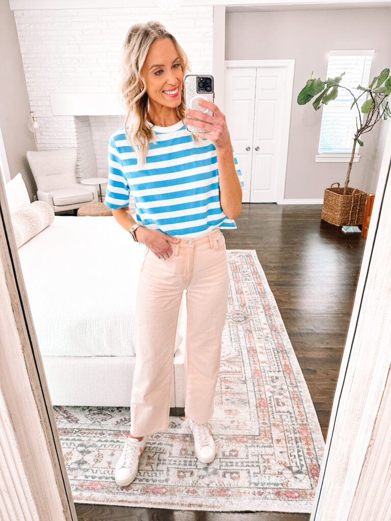 Have you noticed that colored jeans and pants are really trending lately? From brights like a bold pink, green, or orange, to lighter colors, it's all the range lately! I'm sharing how to wear pink jeans with 6 outfit examples. Try a blue and white striped shirt and pink jeans. 