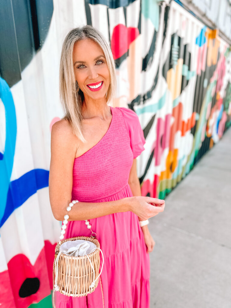 I'm sharing three Amazon event dresses all under $50 perfect as wedding guest dresses or anything else! This one shoulder pink puff sleeve dress is amazing!