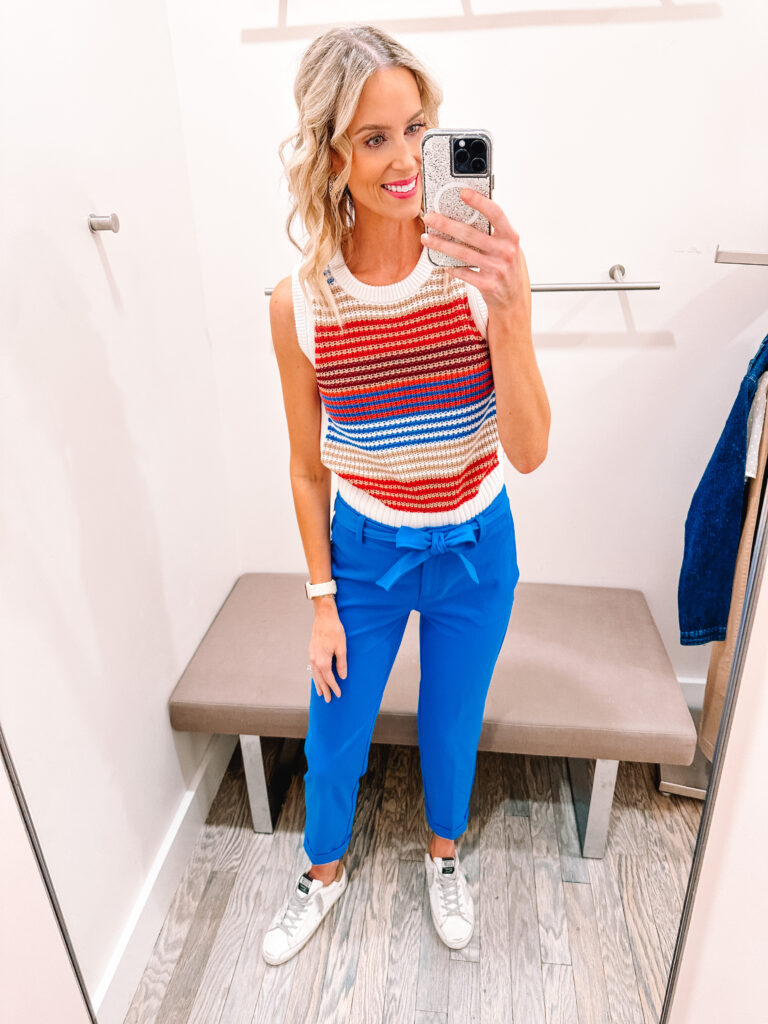 You guys I have a HUGE LOFT try on haul for you. I am talking HUGE. 13 fall outfits styled for you with business casual outfit ideas, fall family photo dresses, work to weekend looks, and more! You will love these blue work pants with the striped sweater tank. 