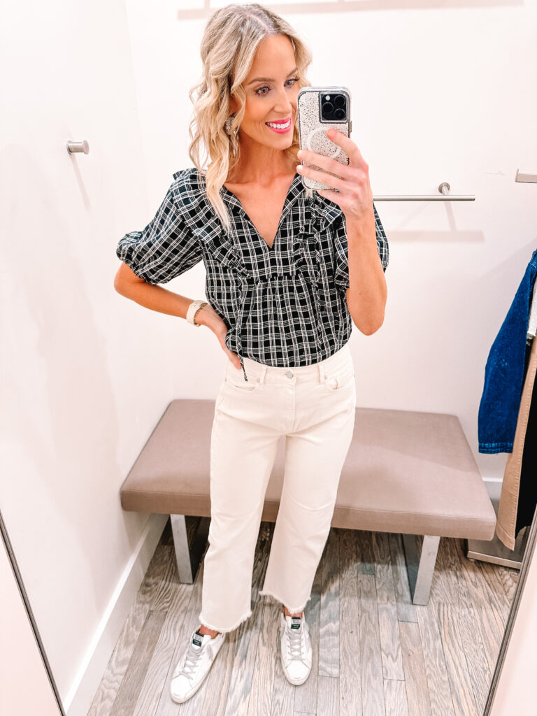 You guys I have a HUGE LOFT try on haul for you. I am talking HUGE. 13 fall outfits styled for you with business casual outfit ideas, fall family photo dresses, work to weekend looks, and more! How great is this plaid blouse with the cream colored jeans?!