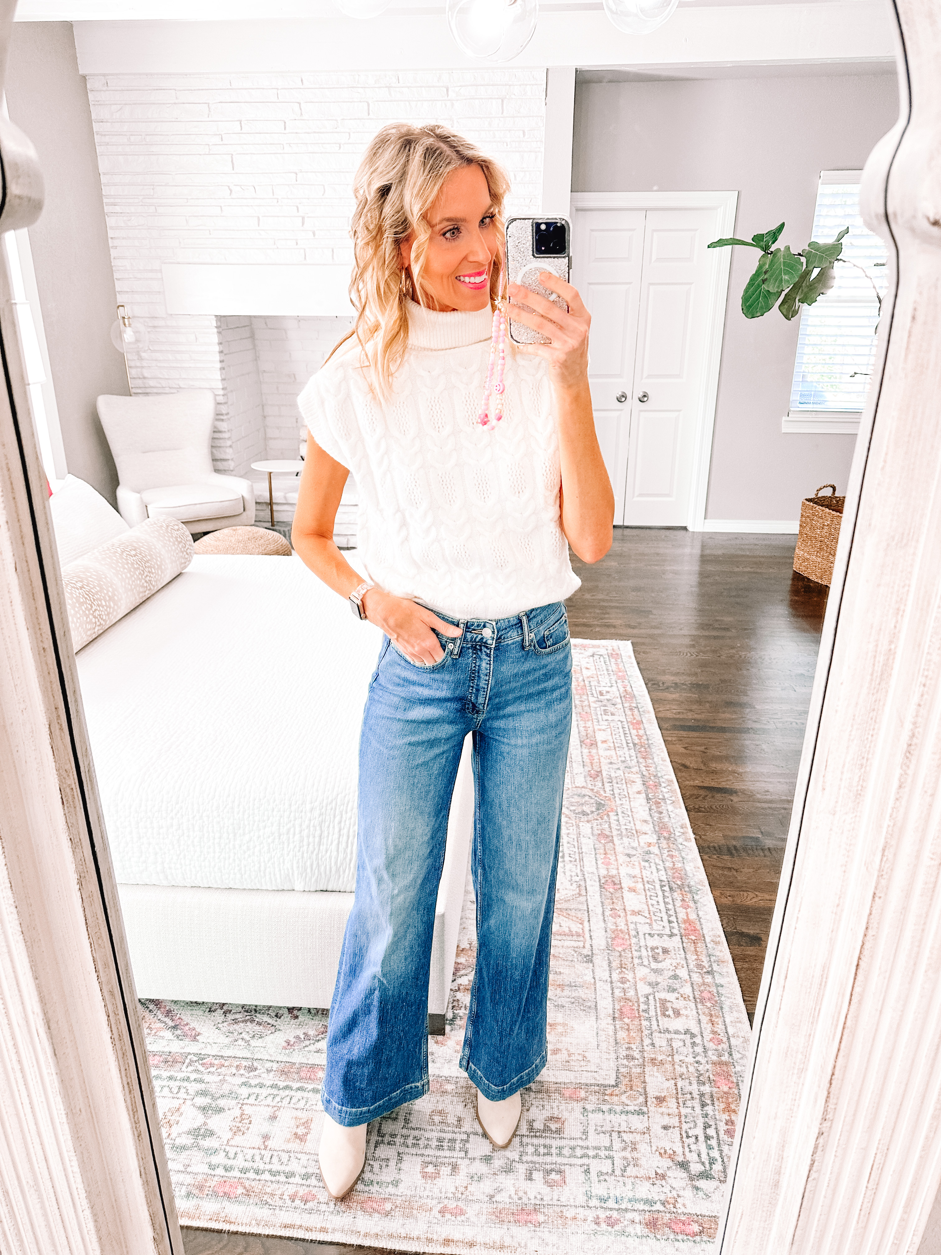 You'll love this huge Walmart fall try on haul with nine total outfits made up of mix and match pieces all $38 and under including shoes!! I cannot get over how much I like these wide leg jeans with this cream sweater vest!