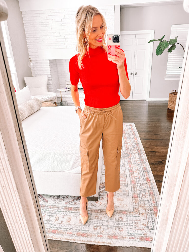 Rounding up some really fun, affordable Thanksgiving outfit ideas. All items are $25 or under and perfect for indulging in all the yummy food! These camel faux leather joggers are so great with a red sweater. 