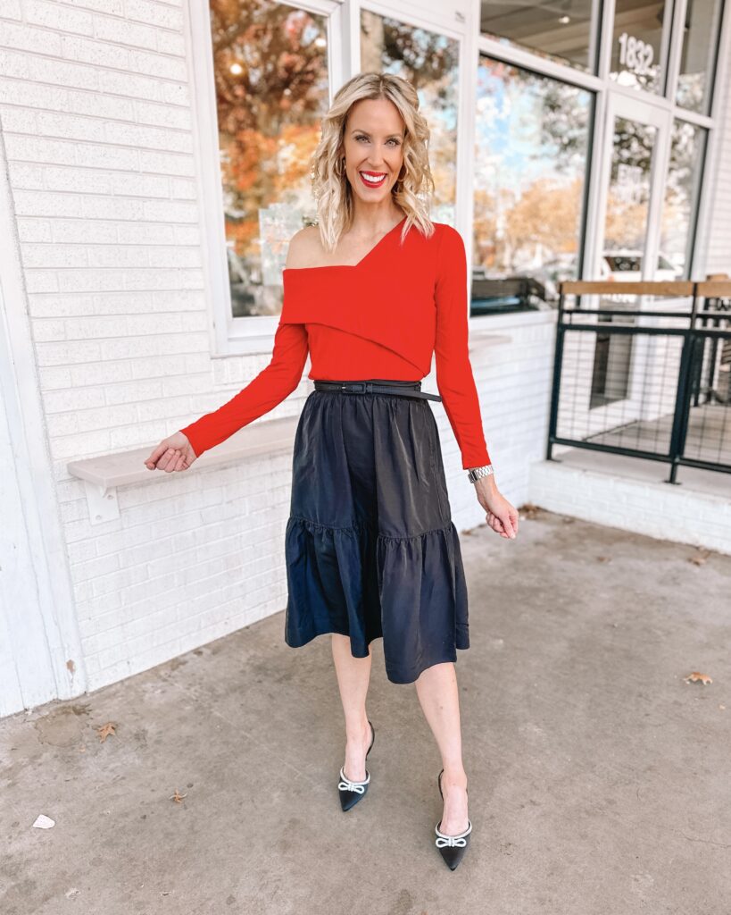 You'll love this Walmart holiday outfit idea! An affordable but gorgeous black skirt with an off the shoulder red top! Perfect for a work party. 