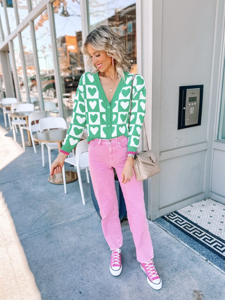 How adorable is this $16 Walmart heart cardigan in the graphic green and white?! Wear it open or closed dressed up or down. I paired it with my pink jeans and pink converse for an extra fun dose of color!