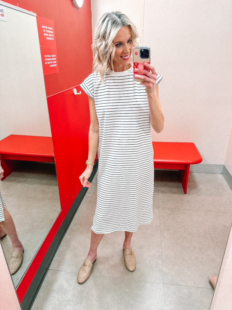 I am SO excited to share this HUGE spring Target try on haul. I am talking 13 affordable outfits with mix and match pieces to keep you stylish all season! This t-shirt style striped dress is so wearable and cute!