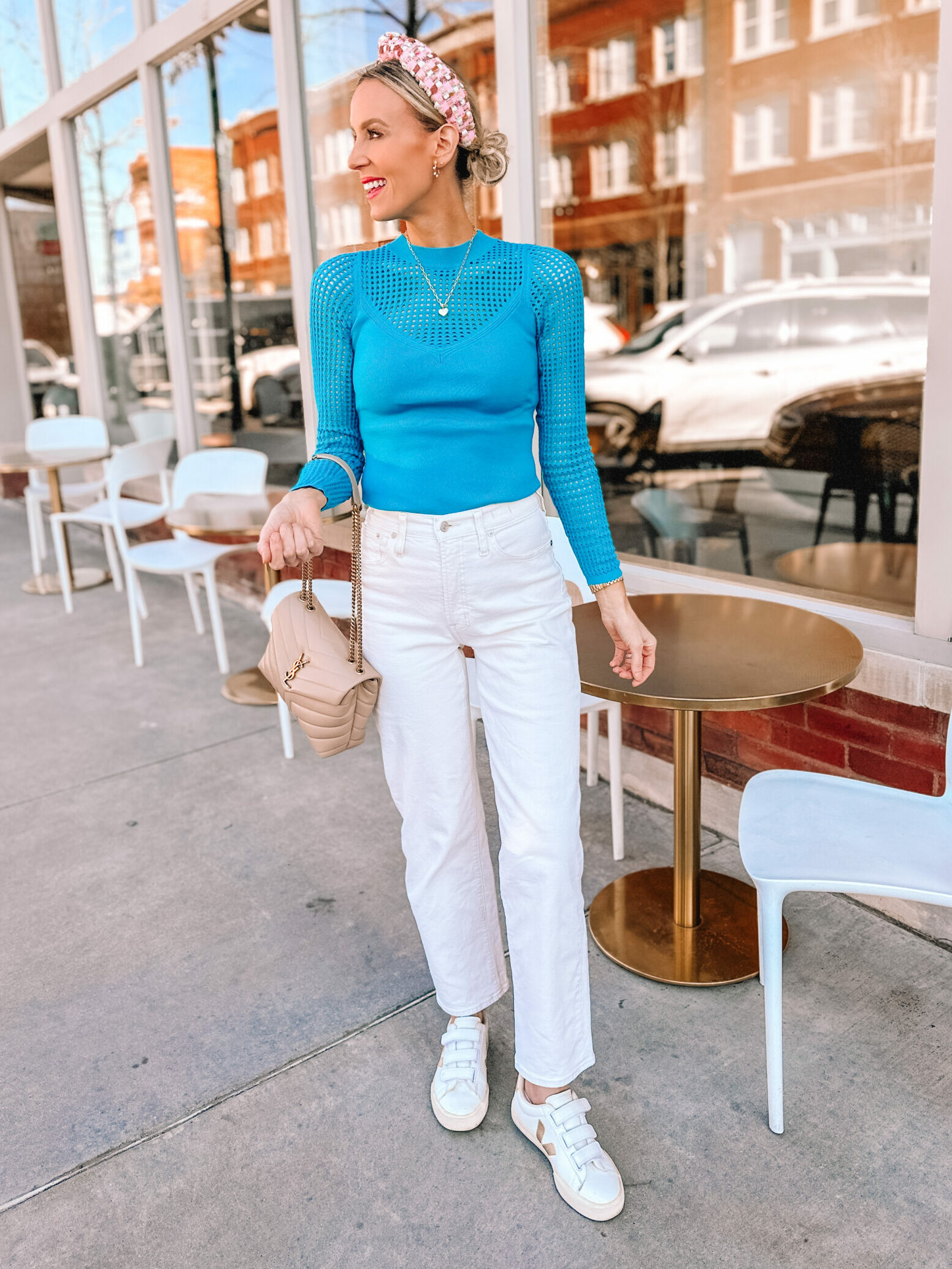 You will love this styled spring outfit with this gorgeous $22 light knit sweater with the perforated detail. 